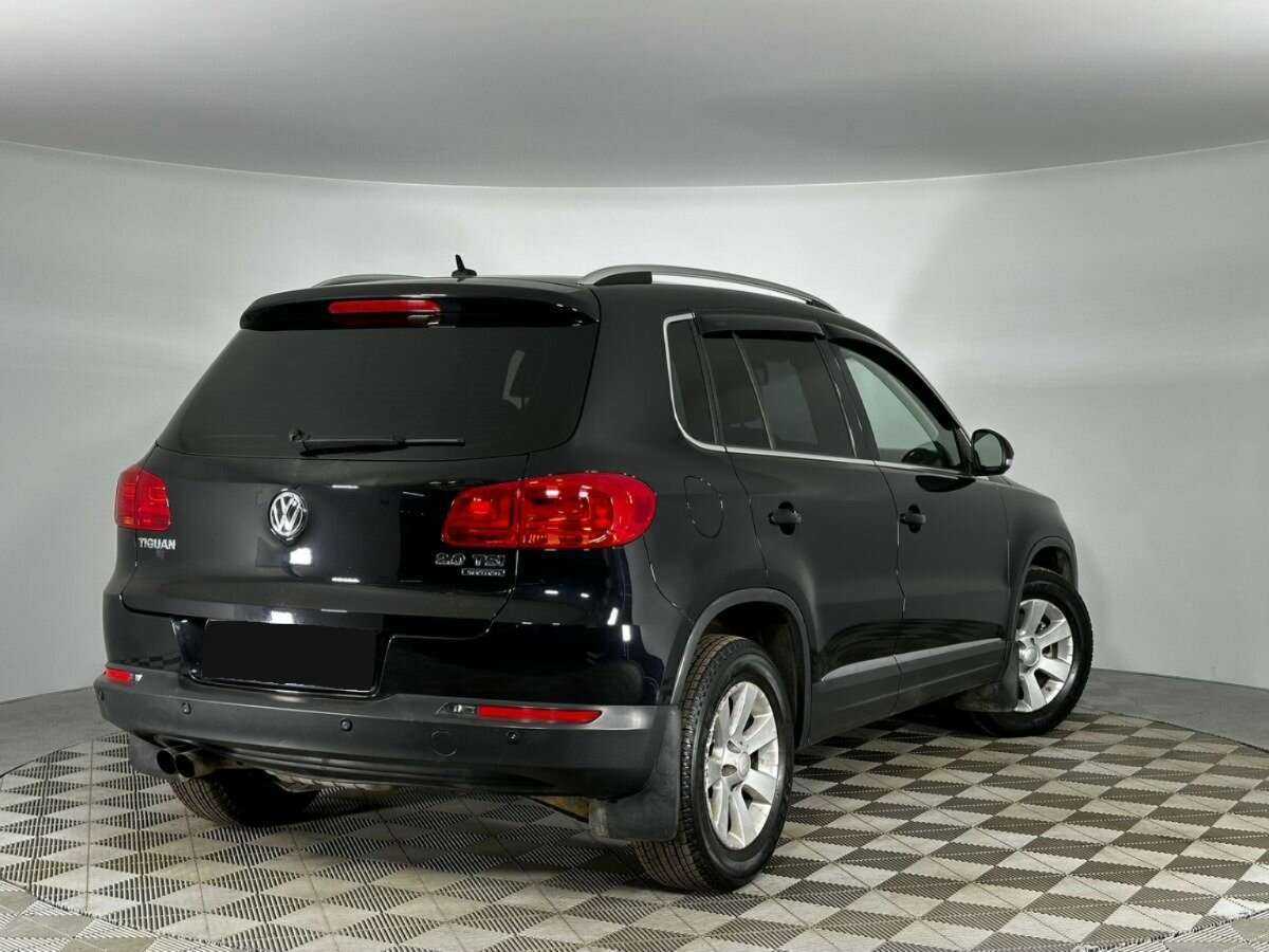 Volkswagen Tiguan б/у, 2013, Автоматическая. Фото: #1